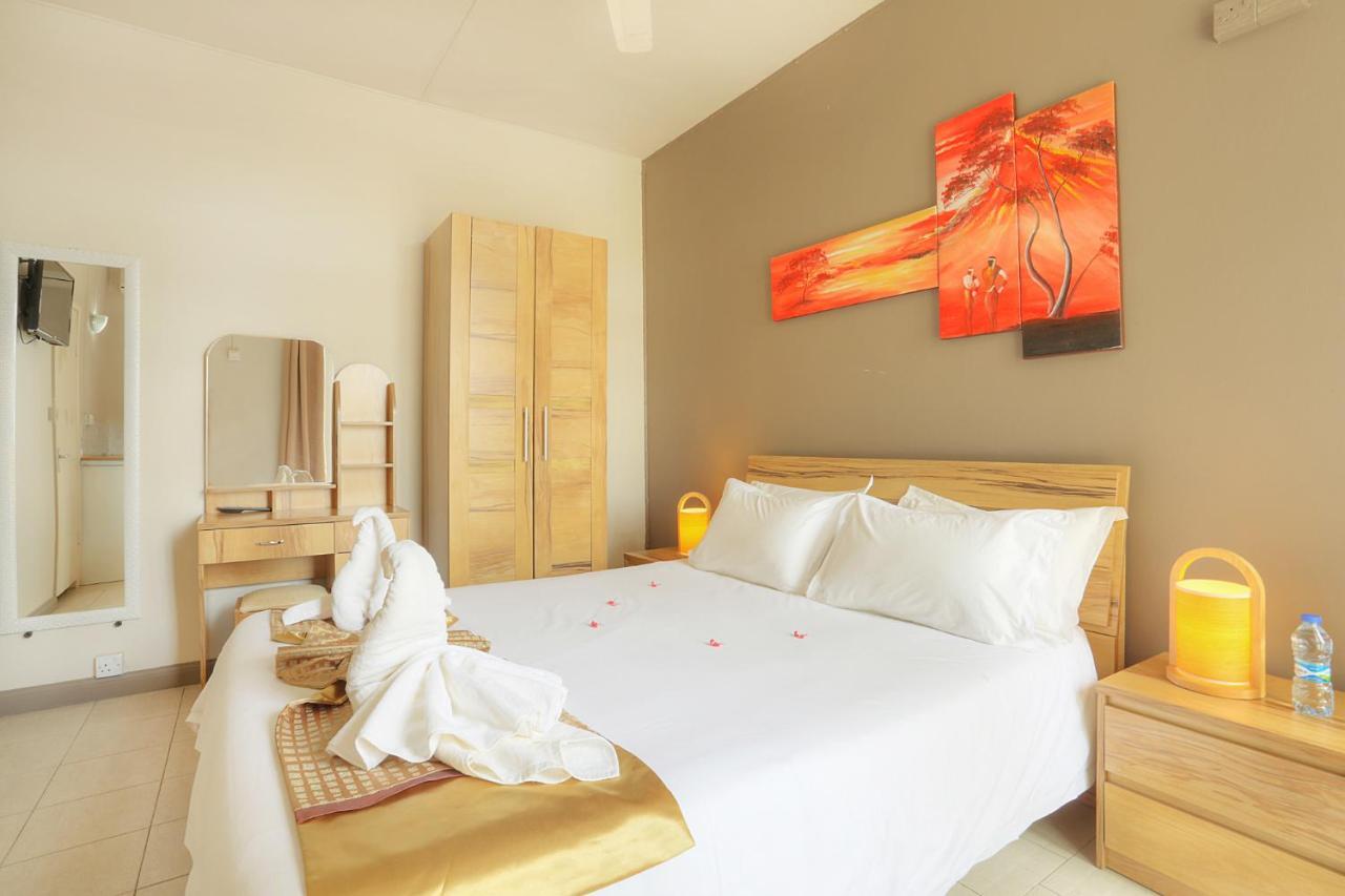 Dzama Hotel Grand Bay Luaran gambar